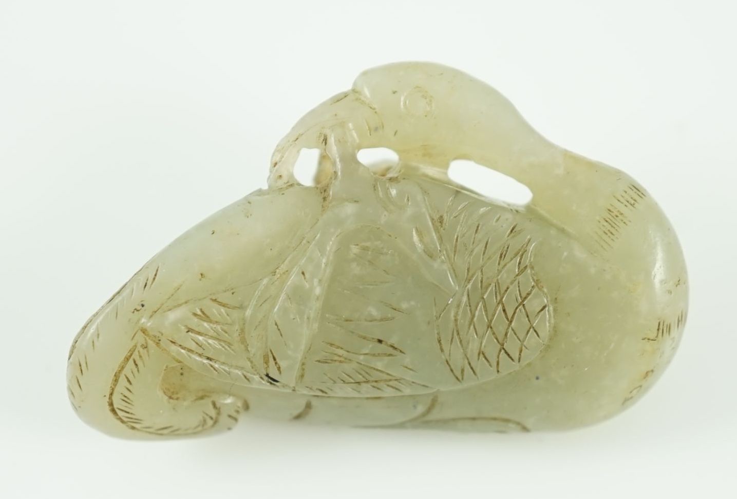 A Chinese pale celadon jade carving of a duck, possibly Jin-Yuan dynasty 4.8 cm long